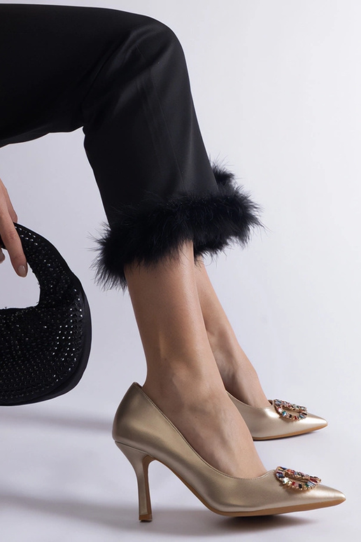 Tacco dorato decorato con zirconi...