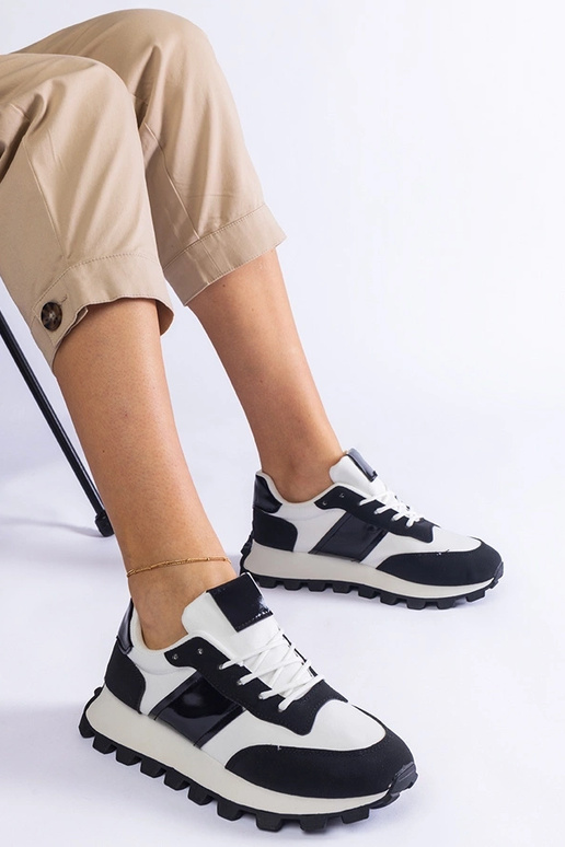 Sneakers nere con protezione Restia...