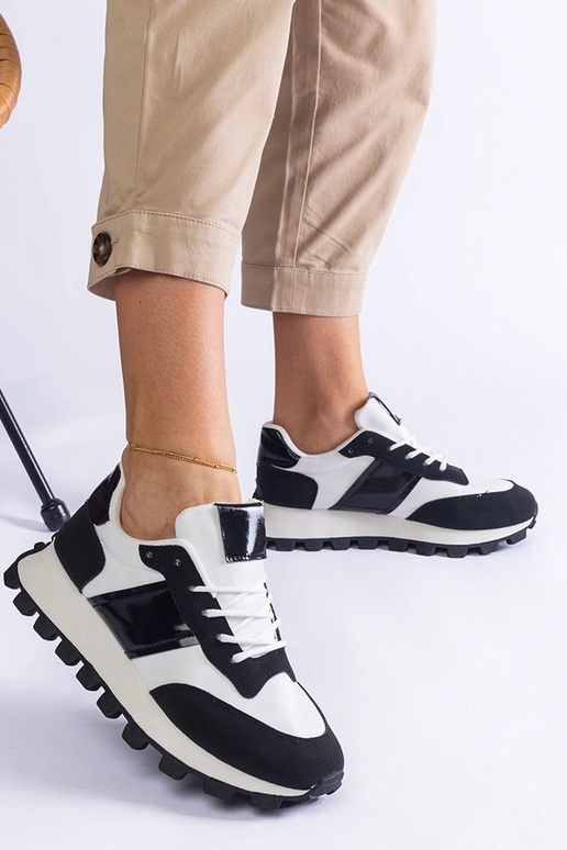 Sneakers nere con protezione Restia...