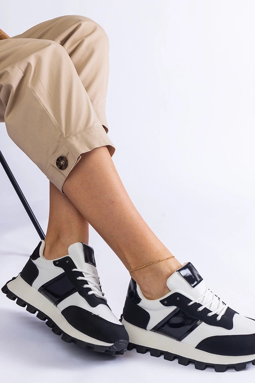 Sneakers nere con protezione Restia...