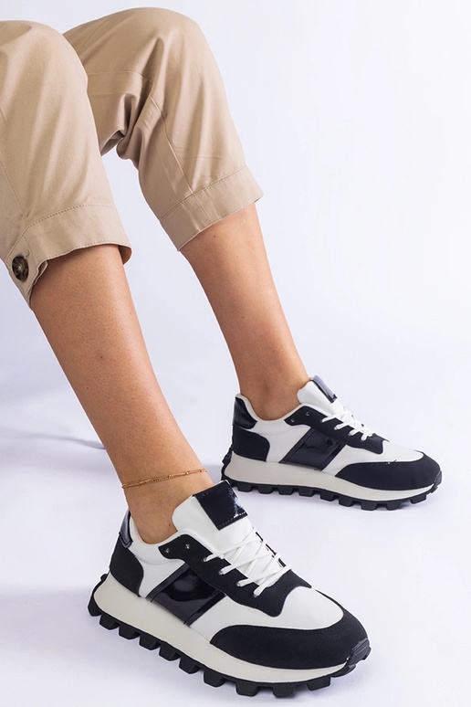 Sneakers nere con protezione Restia...