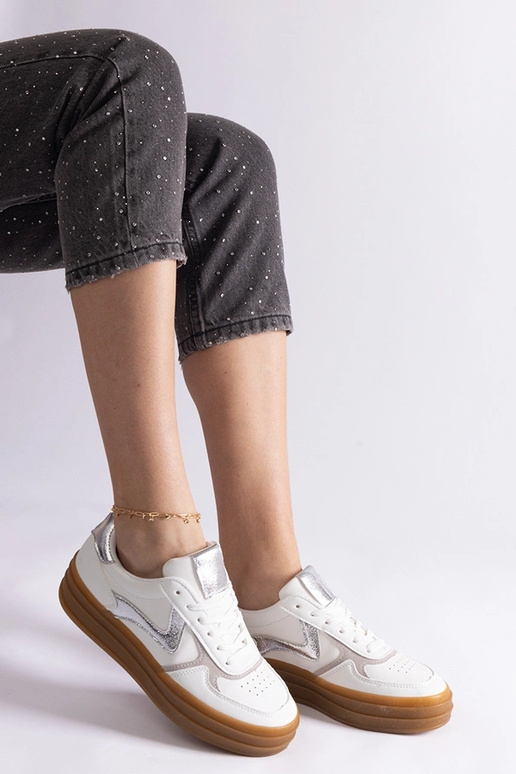 Sneakers bianche e argento con suola...
