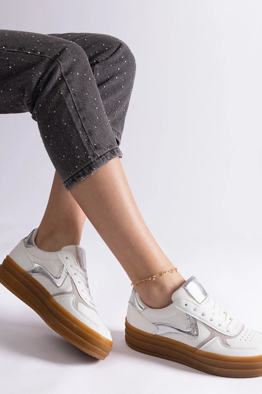Sneakers bianche e argento con suola...