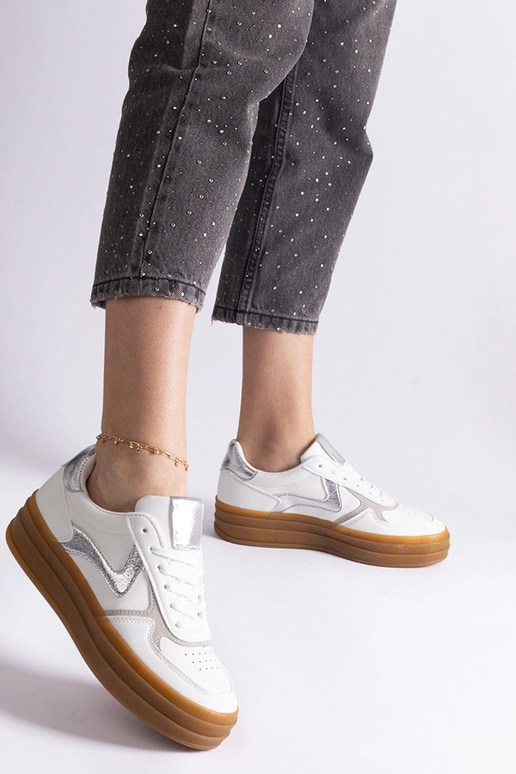 Sneakers bianche e argento con suola...