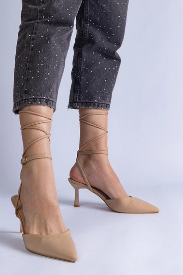 Decolleté beige aperte con...