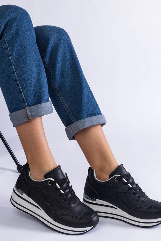 Sneakers nere con plateau decorate...