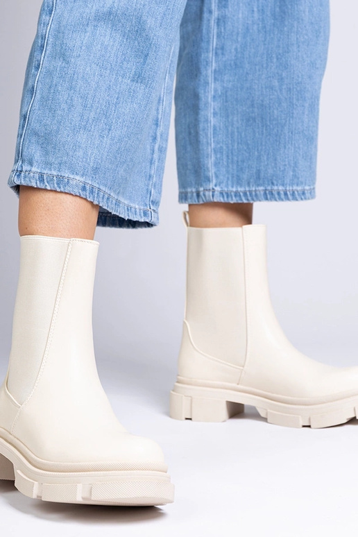 Stivaletti beige con gambale elastico...