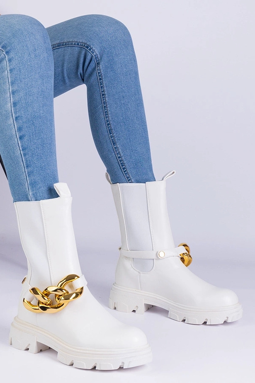 Stivaletti bianchi decorati con una...