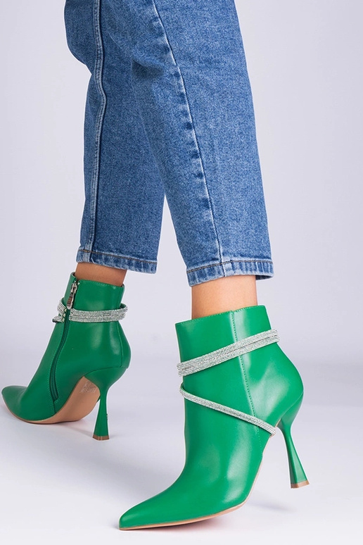 Stivaletti verdi con tacco alto...