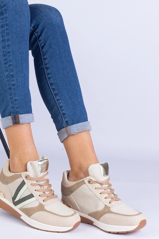 Sneakers beige da donna con zeppa...