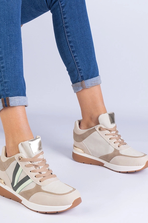 Sneakers beige da donna con zeppa...