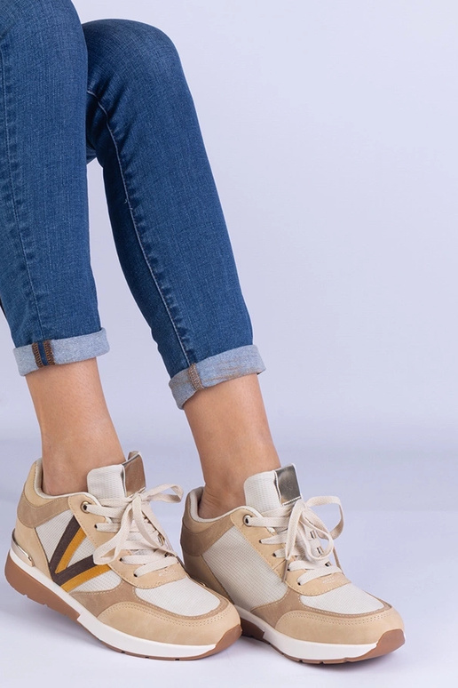 Sneakers da donna marroni con zeppa...