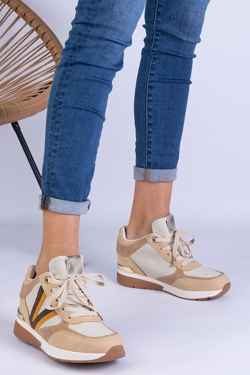 Sneakers da donna marroni con zeppa...