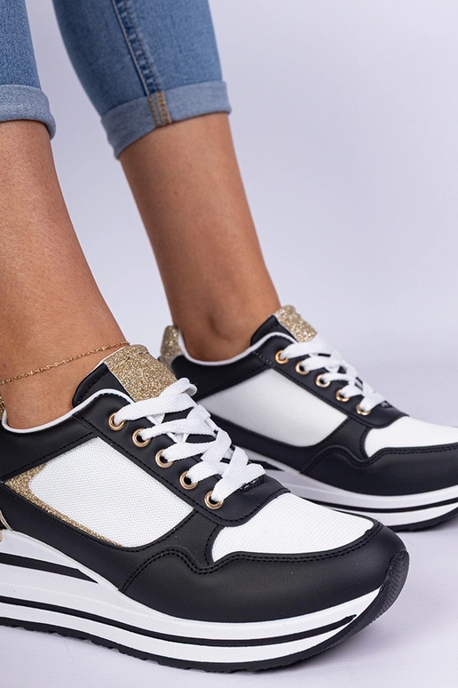 Sneakers nere decorate con glitter e...