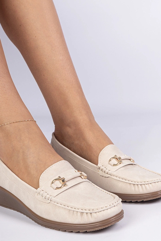 Mokasini crema da donna con tacco...