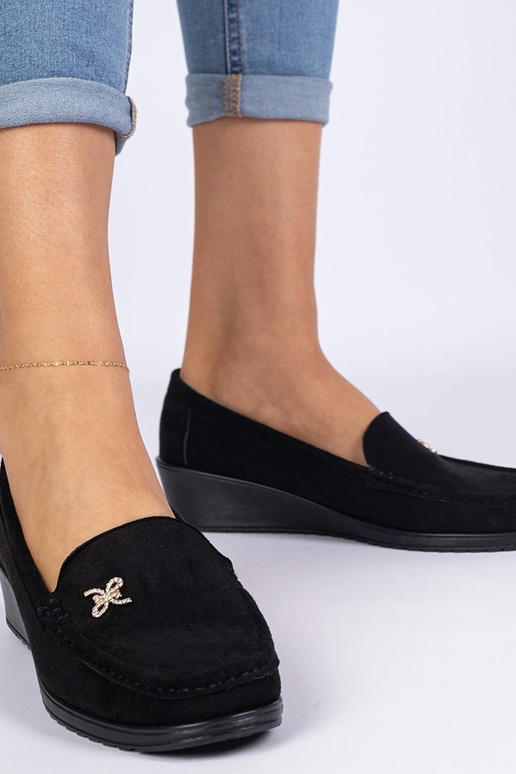 Mocassini neri da donna con plateau...