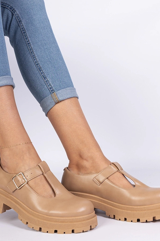 Scarpe con piattaforma in similpelle...