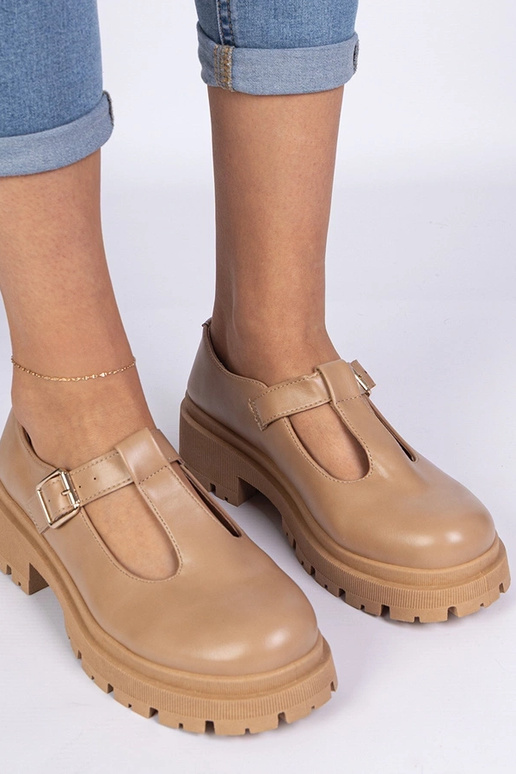 Scarpe con piattaforma in similpelle...