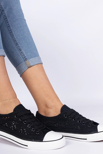 Trampoli neri da donna in...