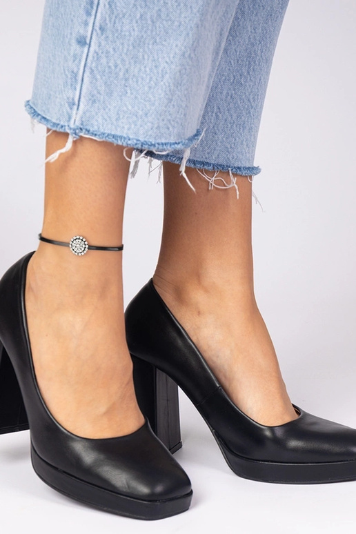 Décolleté nere con tacco massiccio e...