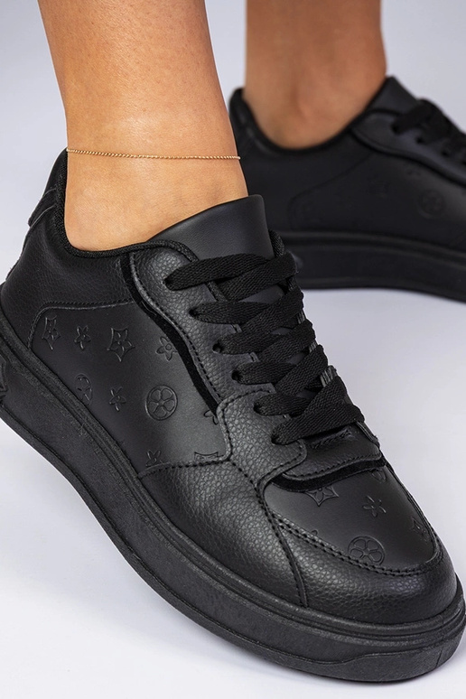 Scarpe sportive nere in similpelle...