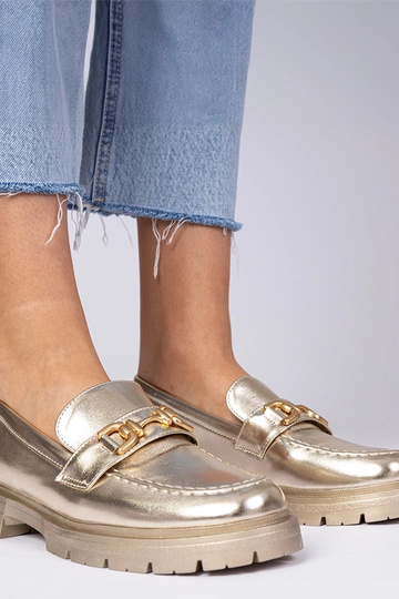 Mocassini eleganti dorati...