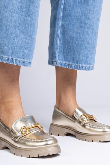 Mocassini eleganti dorati...