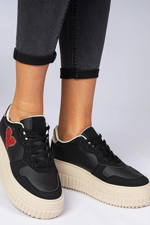 Sneakers donne nere con cuore di...
