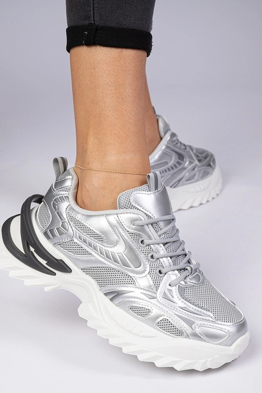 Sneakers sportive argento con suola...