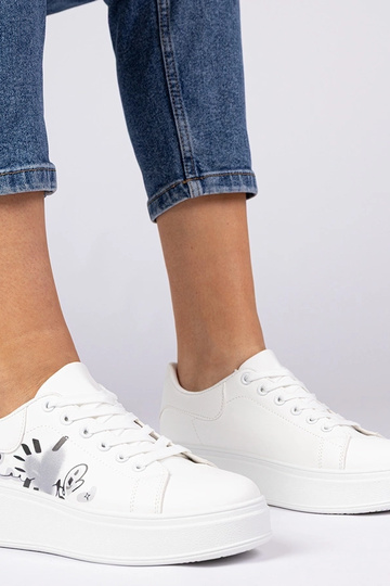 Sneakers bianche da donna...