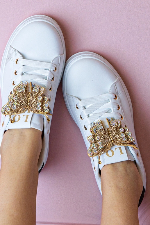 Sneakers bianchi e neri con farfalla...