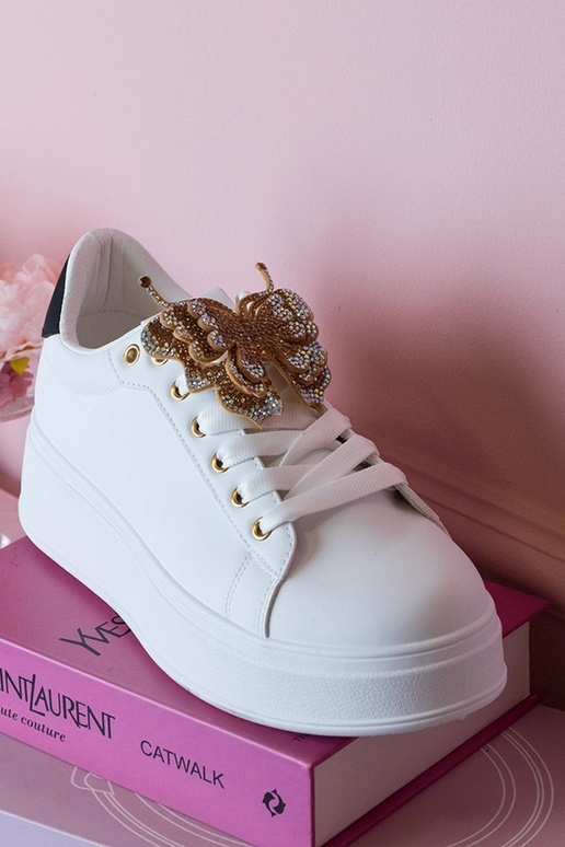 Sneakers bianchi e neri con farfalla...