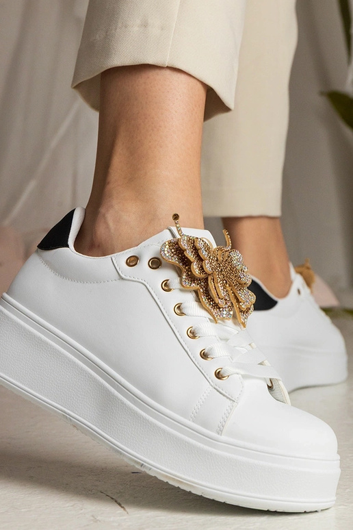 Sneakers bianchi e neri con farfalla...