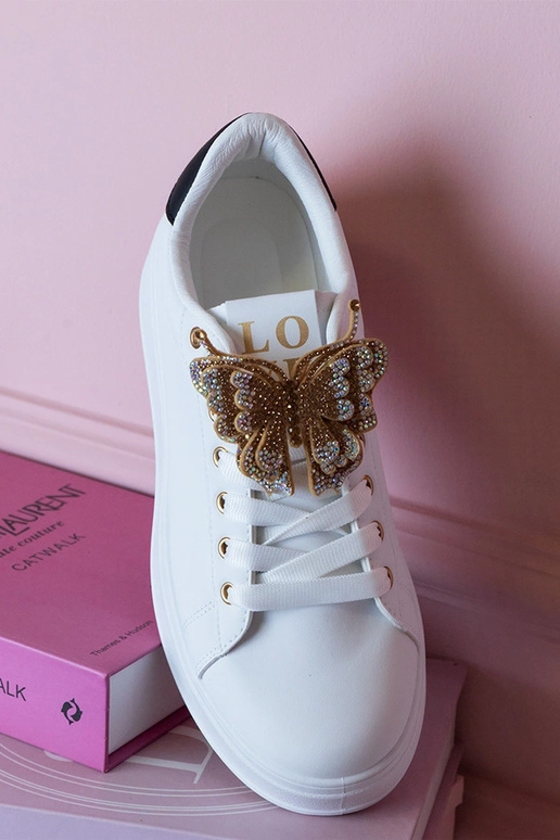 Sneakers bianchi e neri con farfalla...