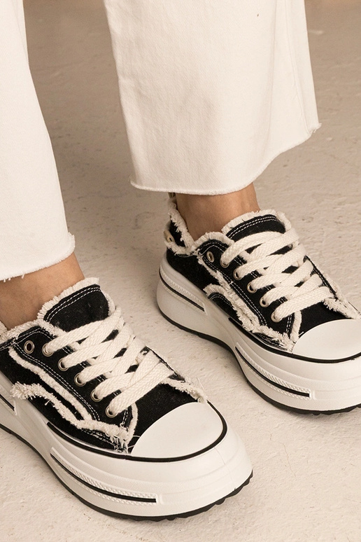 Trampki nere da donna con suola alta...