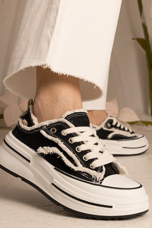 Trampki nere da donna con suola alta...