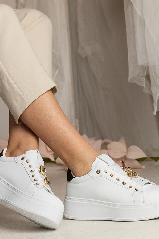 Sneakers bianche e nere da donna...