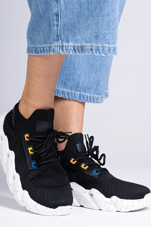 Sneaker da donna nere con suola alta...