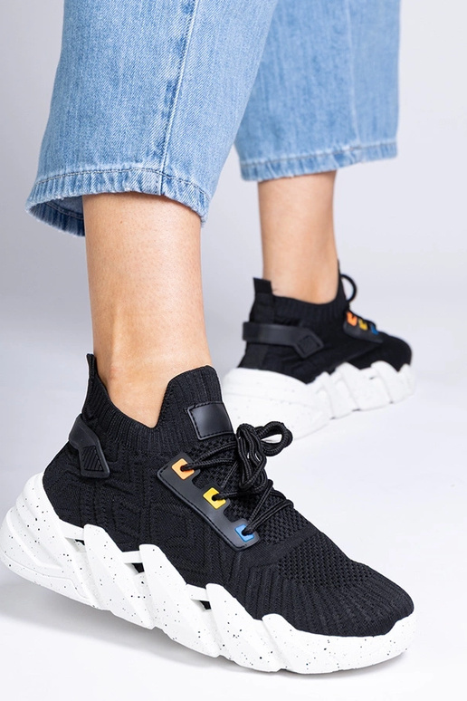 Sneaker da donna nere con suola alta...