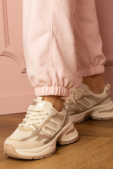 Scarpe sportive sabbia...