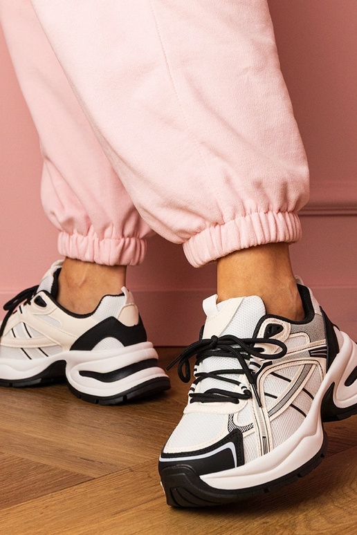 Scarpe sportive bicolore nere e...