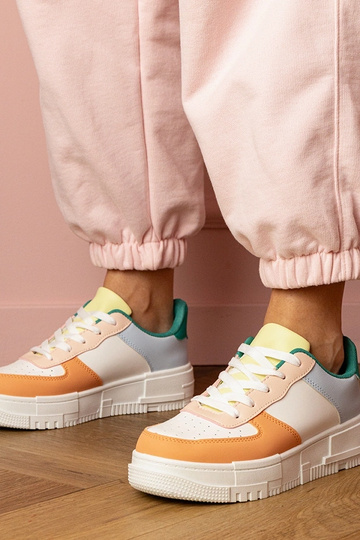 Scarpe sportive arancioni femminili su piattaforma Luneta