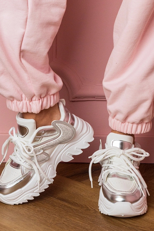 Scarpe sportive da donna bianche con... Scarpe sportive da donna bianche con...