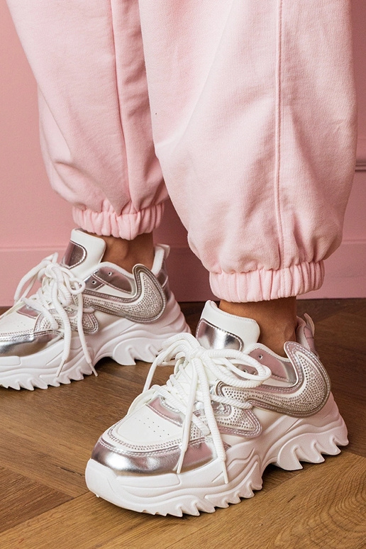 Scarpe sportive da donna bianche con... Scarpe sportive da donna bianche con...