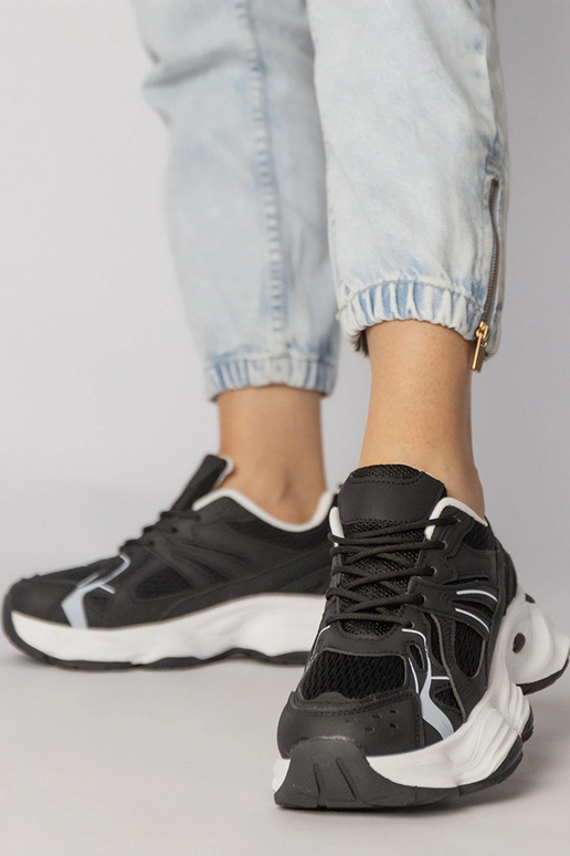 Scarpe sportive nere con suola...