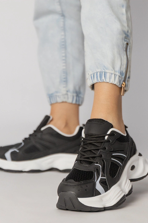 Scarpe sportive nere con suola...