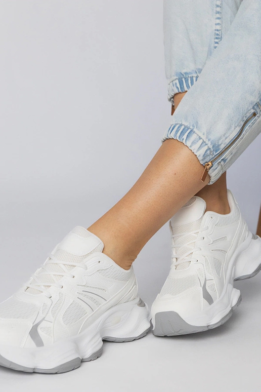 Scarpe sportive bianche con suola...