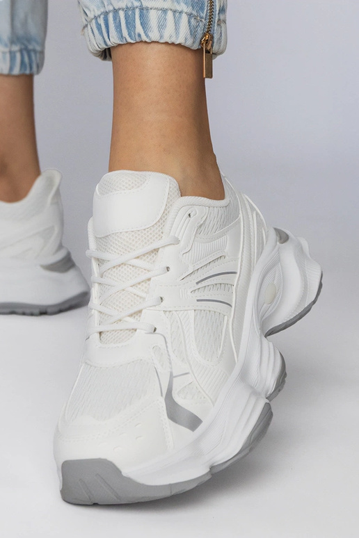 Scarpe sportive bianche con suola...