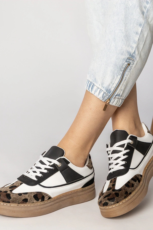 Scarpe sportive bianche e nere con...