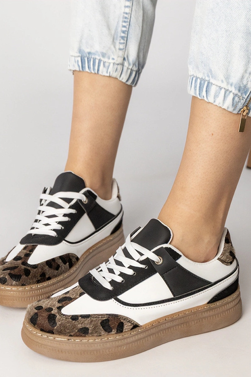 Scarpe sportive bianche e nere con...